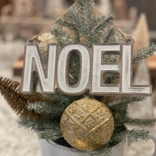 Noel Carved Christmas Ornie